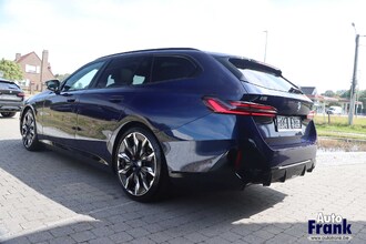 BMW I5 M60 / TOURING / PANO / TREKHK / B&W / HUD / ONDERSTL PRO / INTGRL STR IMG_6558.jpg