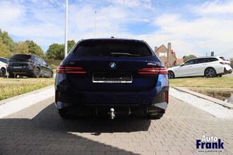 BMW I5 M60 / TOURING / PANO / TREKHK / B&W / HUD / ONDERSTL PRO / INTGRL STR IMG_6559.jpg