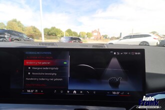 BMW I5 M60 / TOURING / PANO / TREKHK / B&W / HUD / ONDERSTL PRO / INTGRL STR IMG_6619.jpg